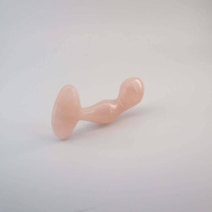 Aetheris handcrafted rose quartz crystal wellness wand made from natural rose quartz for meditation, mindfulness, energy work, relaxation, and luxury self-care rituals.