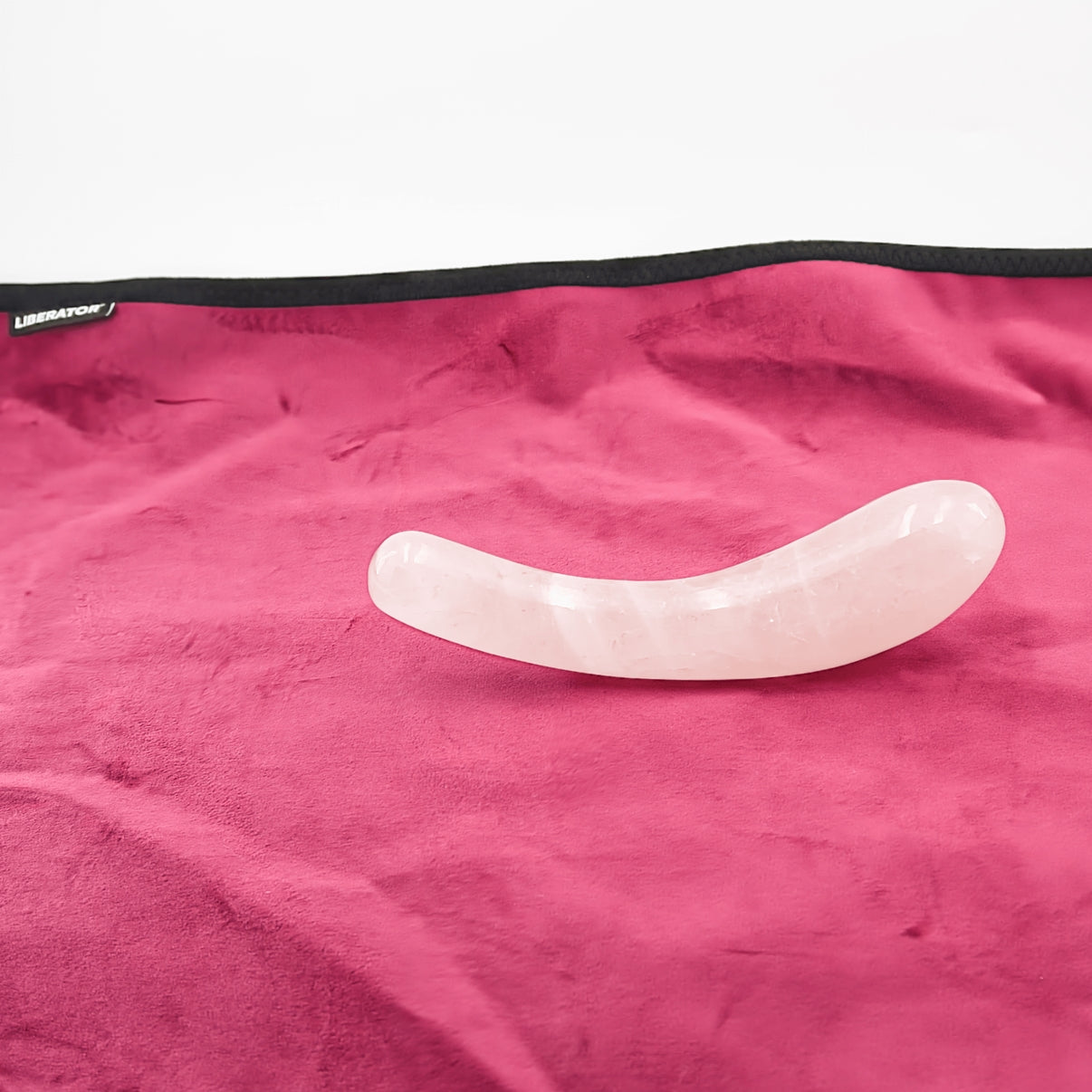 Arcella handcrafted rose quartz crystal wand made from natural rose quartz for meditation, mindfulness, energy work, relaxation, chakra balancing, and holistic self-care.