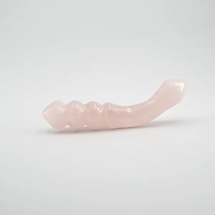 Curvona natural rose quartz crystal wand for meditation, wellness, chakra balancing, relaxation, and energy work.