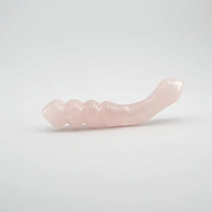 Curvona natural rose quartz crystal wand for meditation, wellness, chakra balancing, relaxation, and energy work.