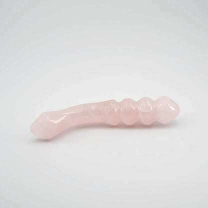 Curvona natural rose quartz crystal wand for meditation, wellness, chakra balancing, relaxation, and energy work.