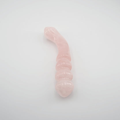 Curvona natural rose quartz crystal wand for meditation, wellness, chakra balancing, relaxation, and energy work.