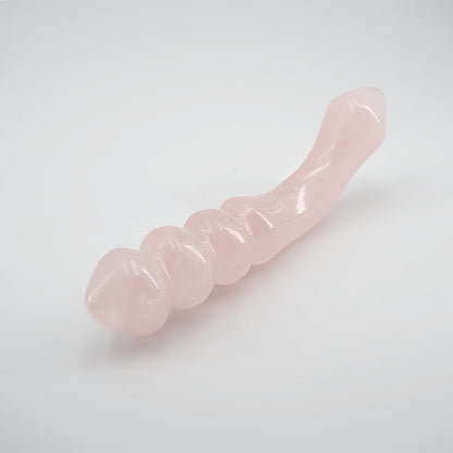 Curvona natural rose quartz crystal wand for meditation, wellness, chakra balancing, relaxation, and energy work.