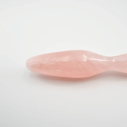 Ellure handcrafted rose quartz crystal wellness wand made from natural rose quartz for meditation, mindfulness, relaxation, energy work, chakra balancing, and luxury self-care rituals.