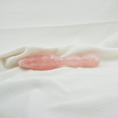 Ellure handcrafted rose quartz crystal wellness wand made from natural rose quartz for meditation, mindfulness, relaxation, energy work, chakra balancing, and luxury self-care rituals.