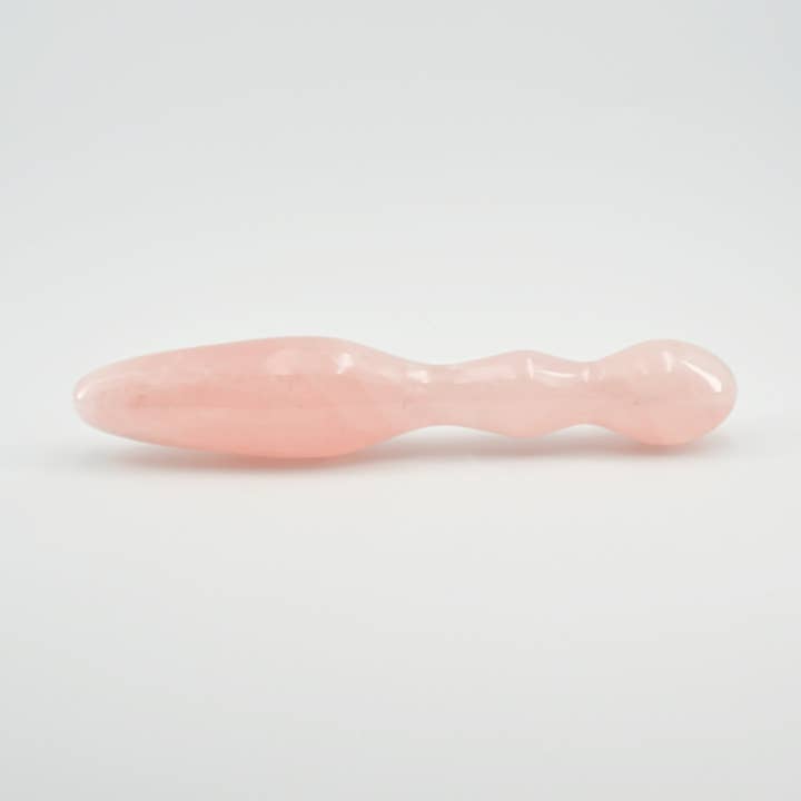 Ellure handcrafted rose quartz crystal wellness wand made from natural rose quartz for meditation, mindfulness, relaxation, energy work, chakra balancing, and luxury self-care rituals.