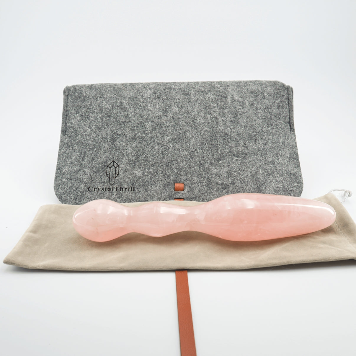 Ellure handcrafted rose quartz crystal wellness wand made from natural rose quartz for meditation, mindfulness, relaxation, energy work, chakra balancing, and luxury self-care rituals.