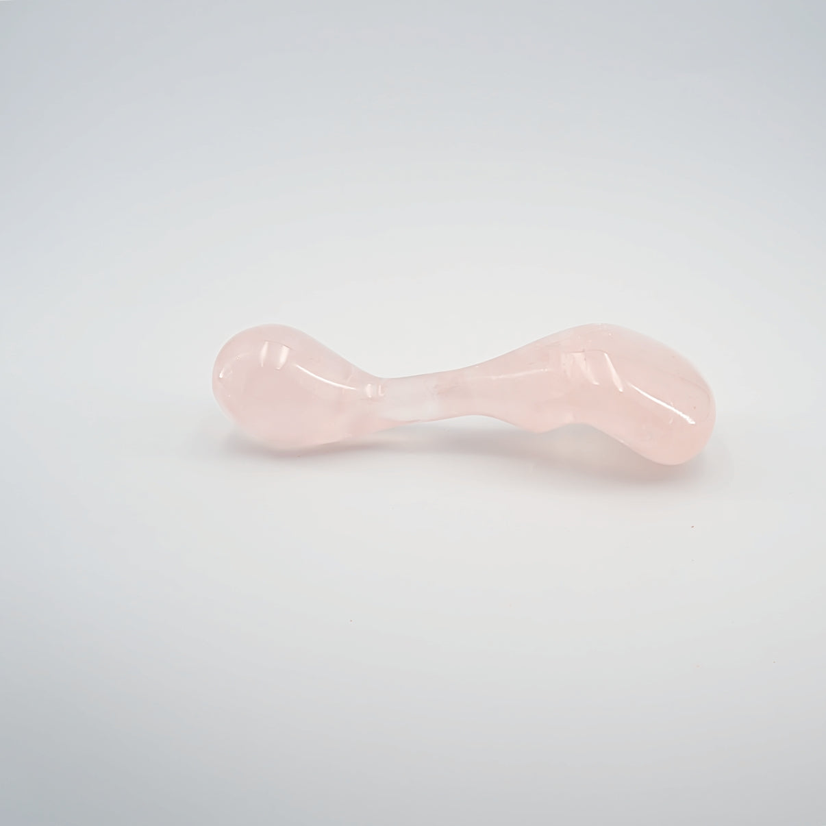 Fleur handcrafted rose quartz crystal wellness wand made from natural rose quartz for meditation, mindfulness, relaxation, chakra balancing, energy work, and luxury self-care rituals.