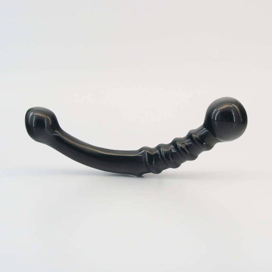 Nyxora handcrafted black obsidian crystal wellness wand made from natural obsidian for meditation, mindfulness, relaxation, energy work, massage, and luxury self-care rituals.