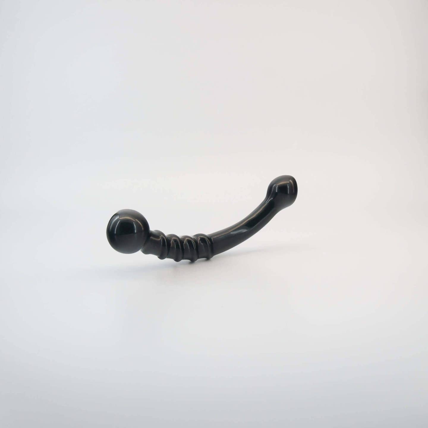 Nyxora handcrafted black obsidian crystal wellness wand made from natural obsidian for meditation, mindfulness, relaxation, energy work, massage, and luxury self-care rituals.