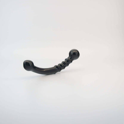 Nyxora handcrafted black obsidian crystal wellness wand made from natural obsidian for meditation, mindfulness, relaxation, energy work, massage, and luxury self-care rituals.