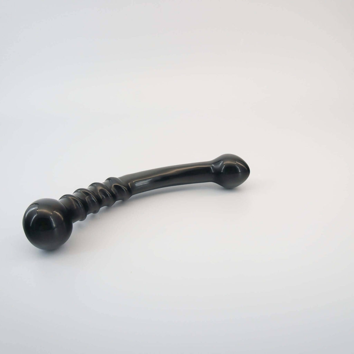 Nyxora handcrafted black obsidian crystal wellness wand made from natural obsidian for meditation, mindfulness, relaxation, energy work, massage, and luxury self-care rituals.