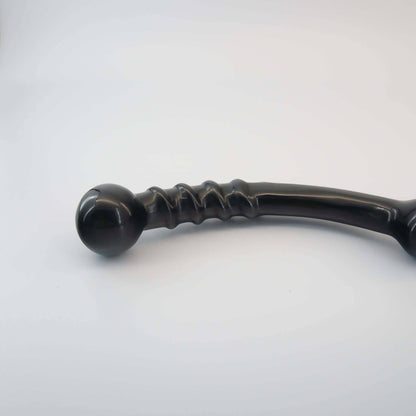 Nyxora handcrafted black obsidian crystal wellness wand made from natural obsidian for meditation, mindfulness, relaxation, energy work, massage, and luxury self-care rituals.