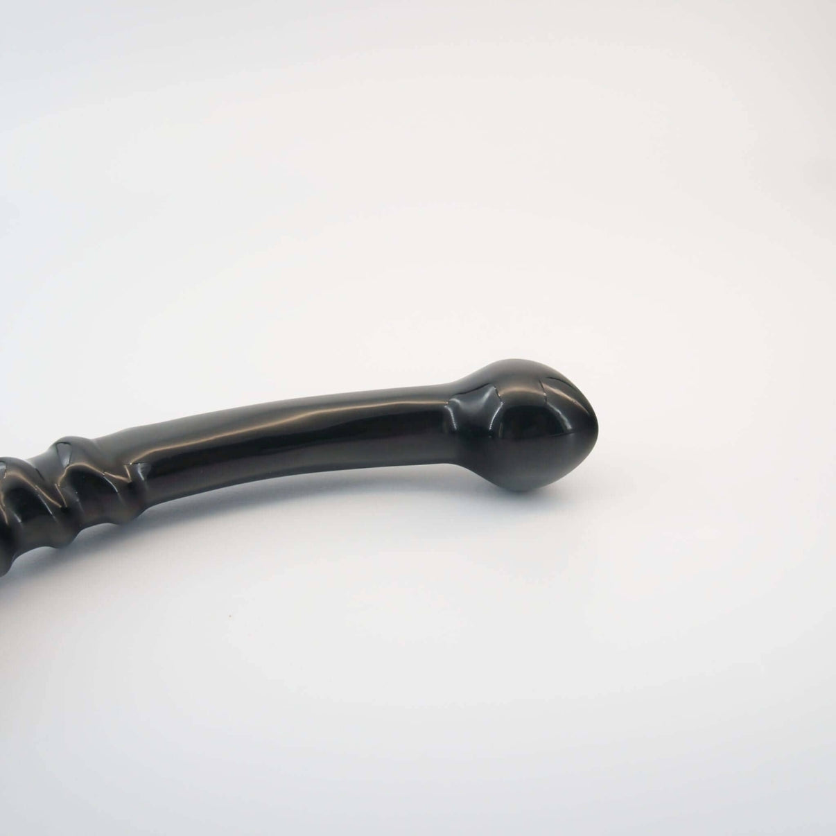 Nyxora handcrafted black obsidian crystal wellness wand made from natural obsidian for meditation, mindfulness, relaxation, energy work, massage, and luxury self-care rituals.