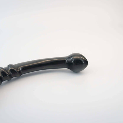 Nyxora handcrafted black obsidian crystal wellness wand made from natural obsidian for meditation, mindfulness, relaxation, energy work, massage, and luxury self-care rituals.