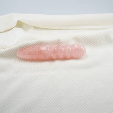 Unduluna handcrafted rose quartz crystal wand made from natural rose quartz for meditation, mindfulness, energy work, chakra balancing, relaxation, and luxury self-care rituals.